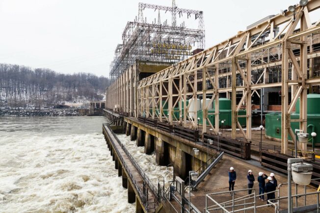 Water rushes out from one side of the Conowingo Dam